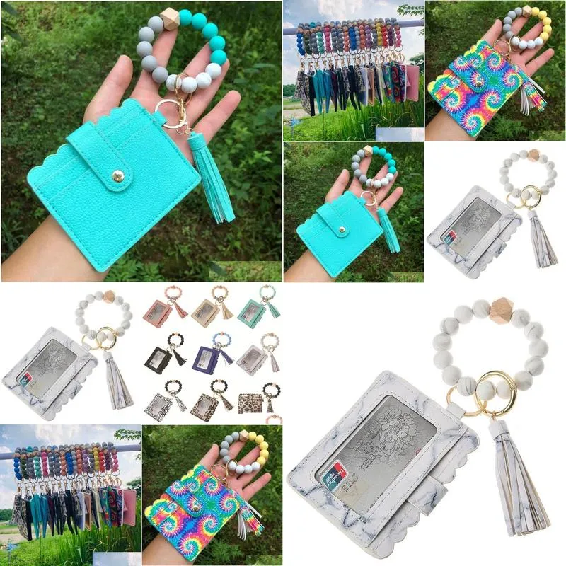 Keychains & Lanyards Pu Leather Bracelet Wallet Keychain Party Favor Tassels Bangle Key Ring Holder Card Bag Sile Beaded Wristlet Keyc Dhdkj