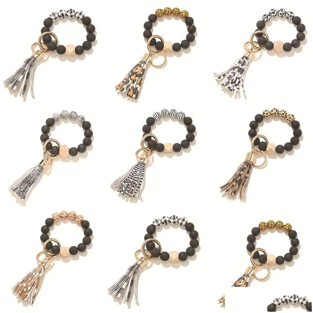 Keychains & Lanyards Black Frosted Wooden Bead Bracelet Keychain Fashion Pattern Tassel Pendant Bracelets Women Girl Key Ring Drop Del Dh0Rn