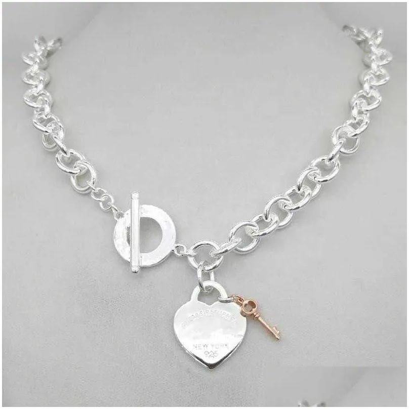 Pendant Necklaces Design Womens Sier Tf Style Necklace Pendant Chain S925 Sterling Key Heart Love Egg Brand Charm Nec Drop Delivery Je Dhf4Y
