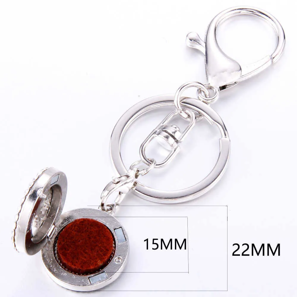 Diamond Inlaid Hollow Stainless Steel Pattern Aromatherapy Essential Oil Magnet Keychain Metal Bag Accessory Car Key Pendant