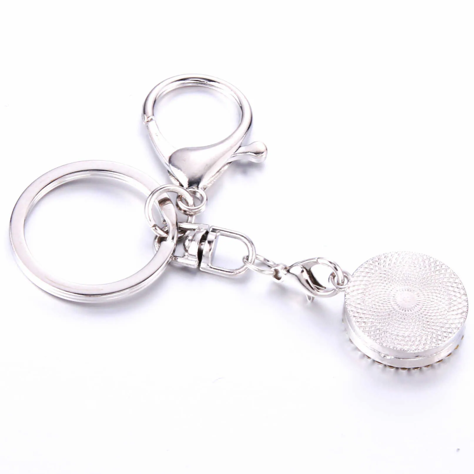 Diamond Inlaid Hollow Stainless Steel Pattern Aromatherapy Essential Oil Magnet Keychain Metal Bag Accessory Car Key Pendant