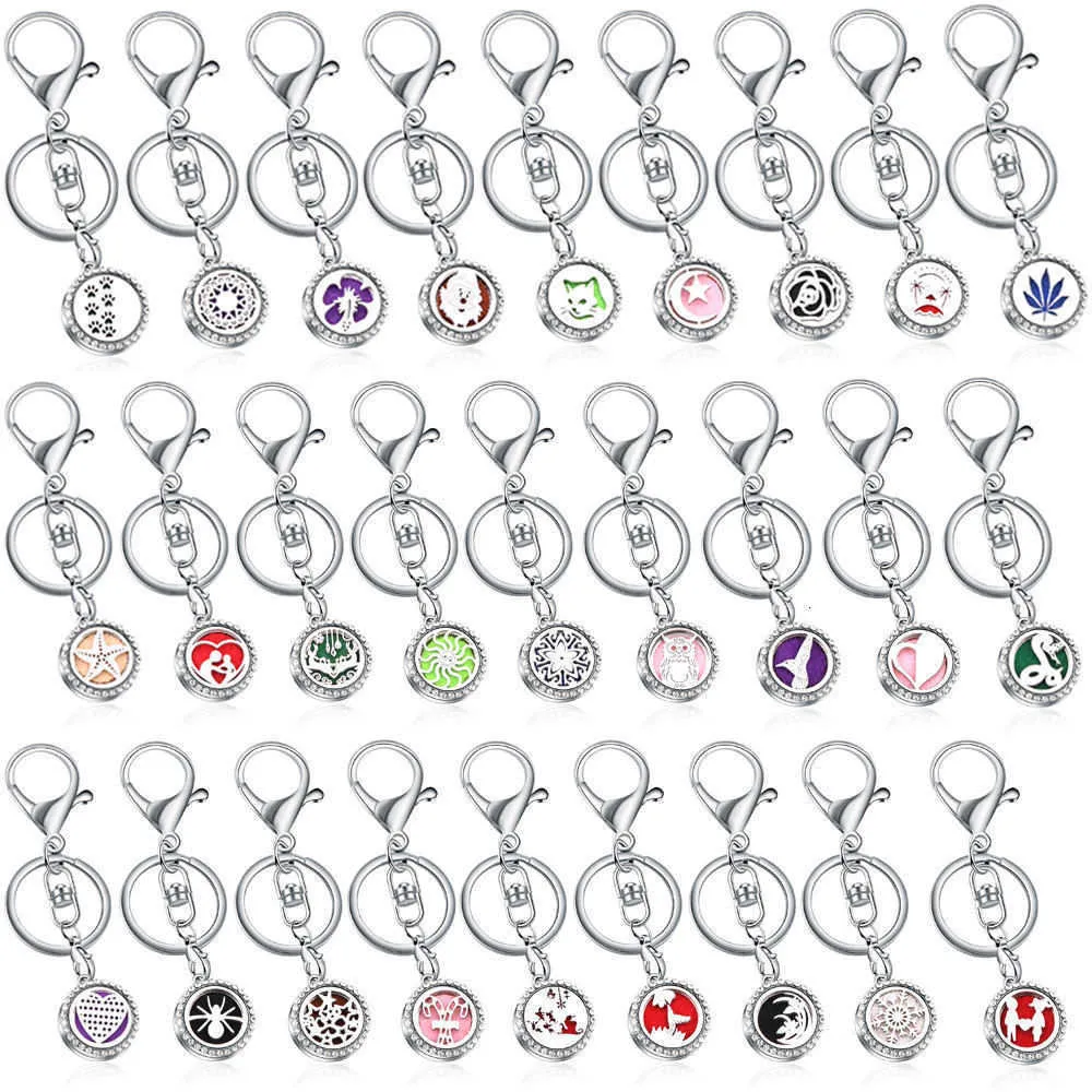 Diamond Inlaid Hollow Stainless Steel Pattern Aromatherapy Essential Oil Magnet Keychain Metal Bag Accessory Car Key Pendant