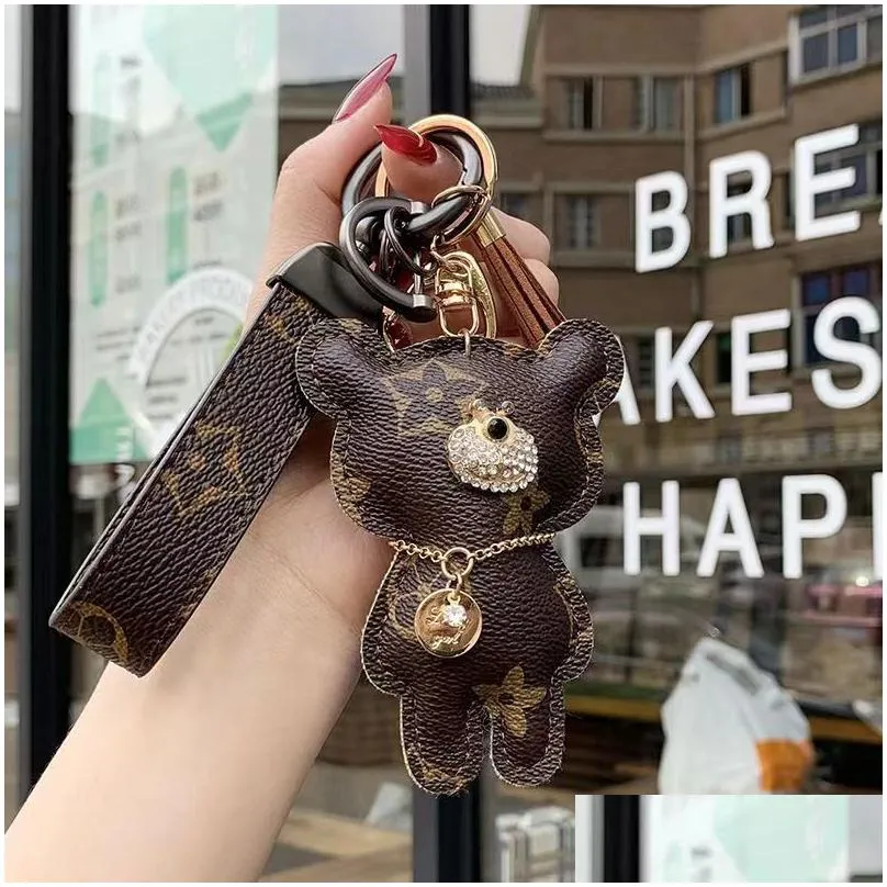 New Designer Key Chain Mono Accessories Key Ring Leather Letter Pattern Gift Designer Pack Decoration Bag decorations Support wholesale