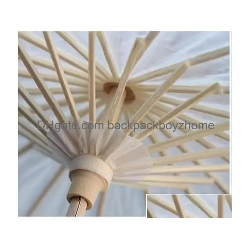 Umbrellas 60Pcs Bridal Wedding Parasols White Paper Umbrellas Beauty Items Chinese Mini Craft Umbrella Diameter 60Cm Drop Delivery Hom Dhz0F