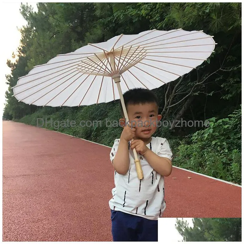 Umbrellas 60Pcs Bridal Wedding Parasols White Paper Umbrellas Beauty Items Chinese Mini Craft Umbrella Diameter 60Cm Drop Delivery Hom Dhc7G