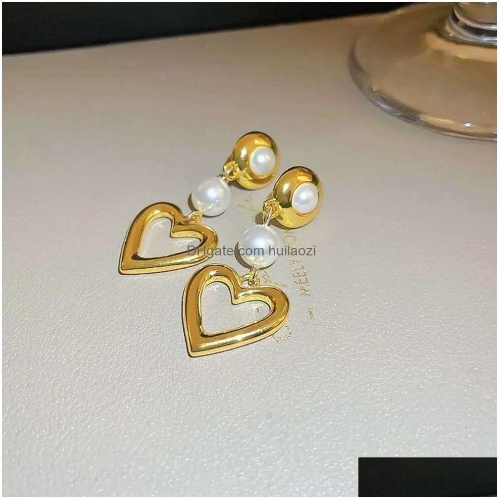 sier needle hollowed out metal love pearl fashionable and high-end feel versatile temperament earrings with heart