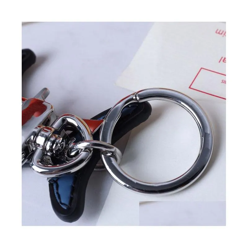 Keychains & Lanyards Cartoon Keychains Luxury Designer Fashion Keychain Sliver Keys Buckle Genuine Leather Blue Shark Pendant Letter Dhrcn