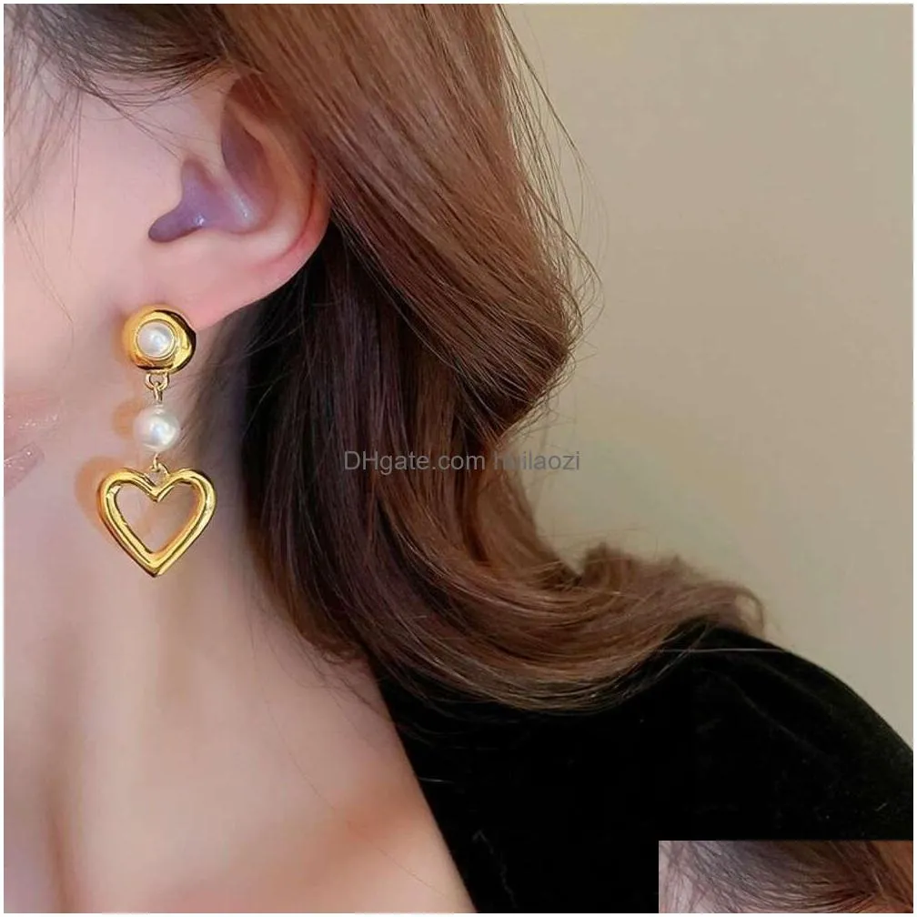 sier needle hollowed out metal love pearl fashionable and high-end feel versatile temperament earrings with heart