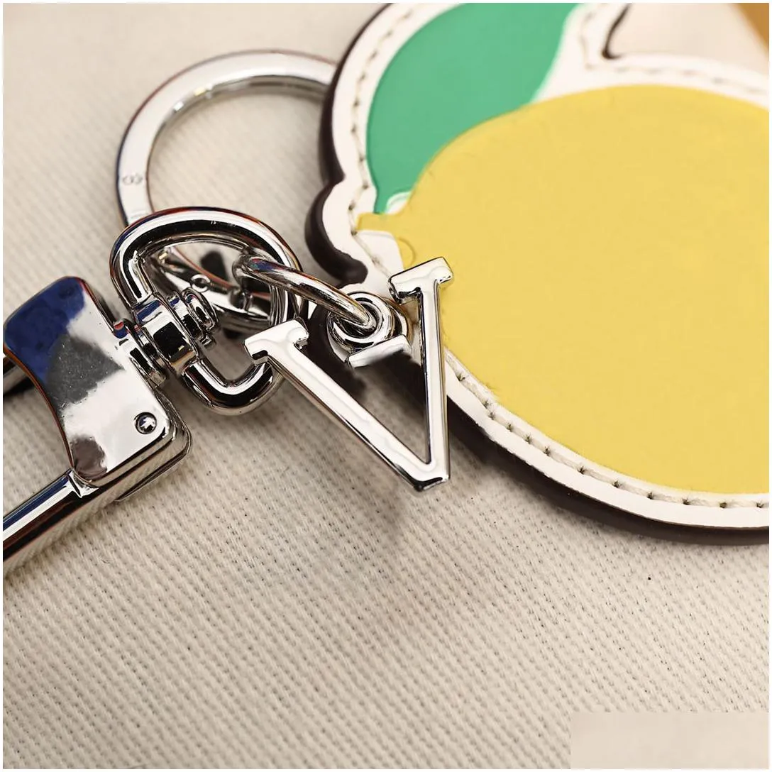 Key Rings Keychain Luxury Designer Fashion Keys Pendant Sier Key Buckle Classic Plant Lemon Genuine Leather High Quality Keychains Or Dhkpr