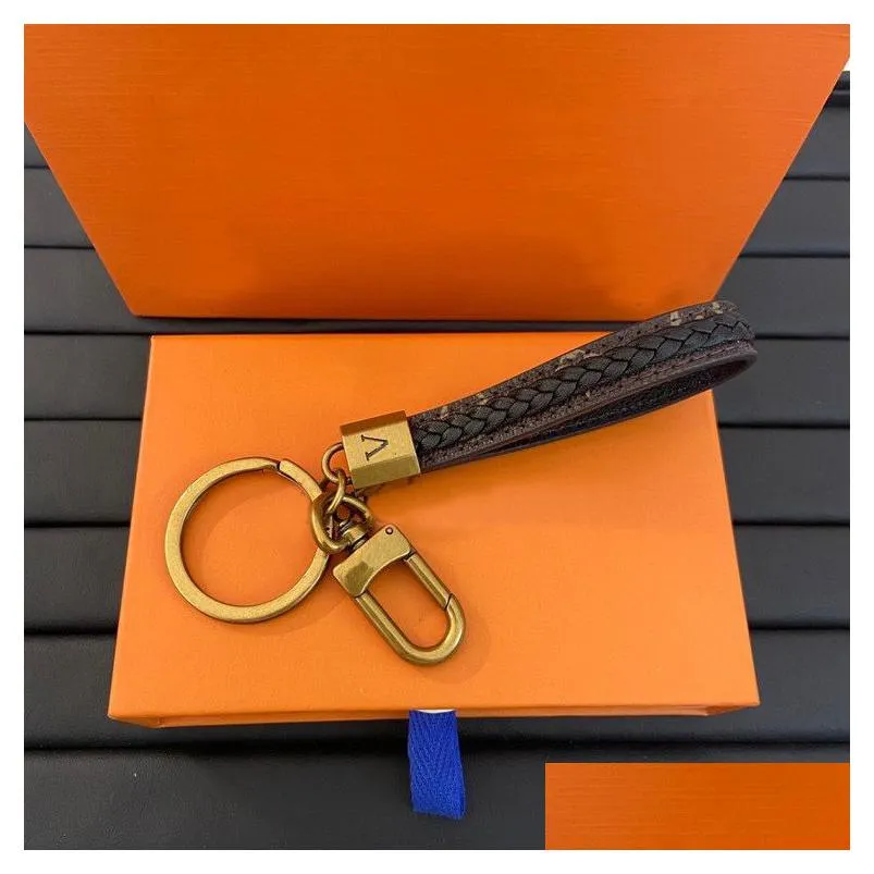 Keychains & Lanyards Fashion Luxury Designer Keychain Classic Brands Key Buckle Flower Letter Pattern Genuine Leather Golden Keychain Dhvrg