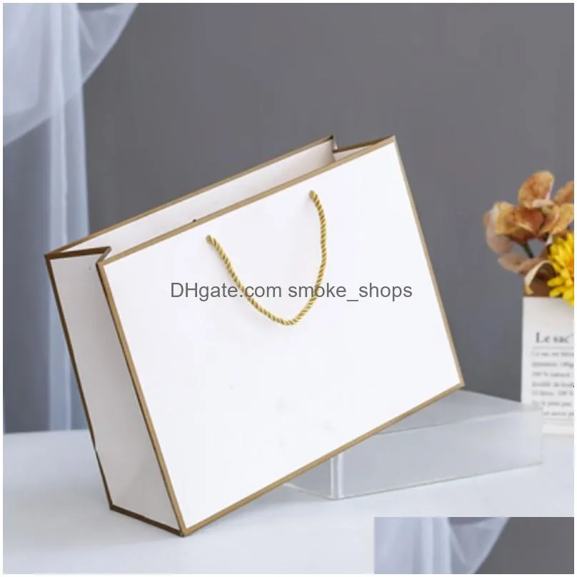 wholesale packaging paper 100pcs custom gift packing bag personalization business shopping clothes package kraft bags party wedding supplier