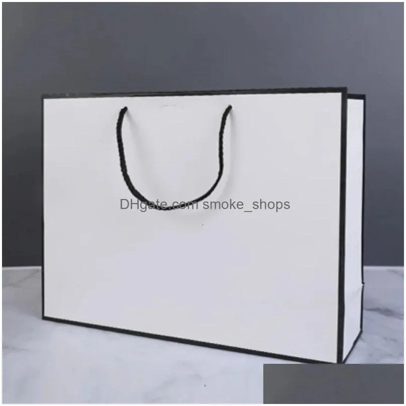 wholesale packaging paper 100pcs custom gift packing bag personalization business shopping clothes package kraft bags party wedding supplier