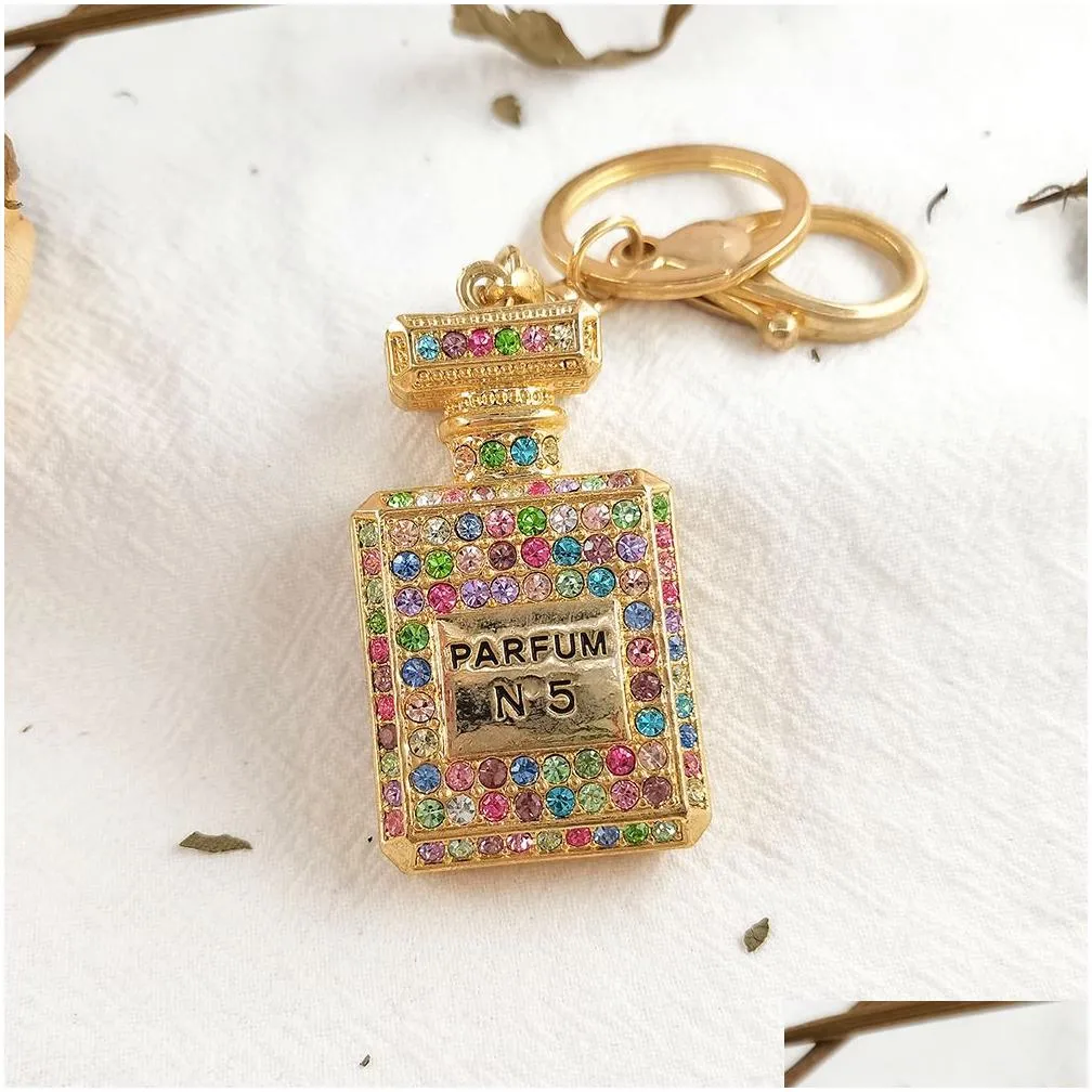 crystal perfume bottle keychains for women creative diamond bow metal key chain car bag pendant small gift jewelry accessories