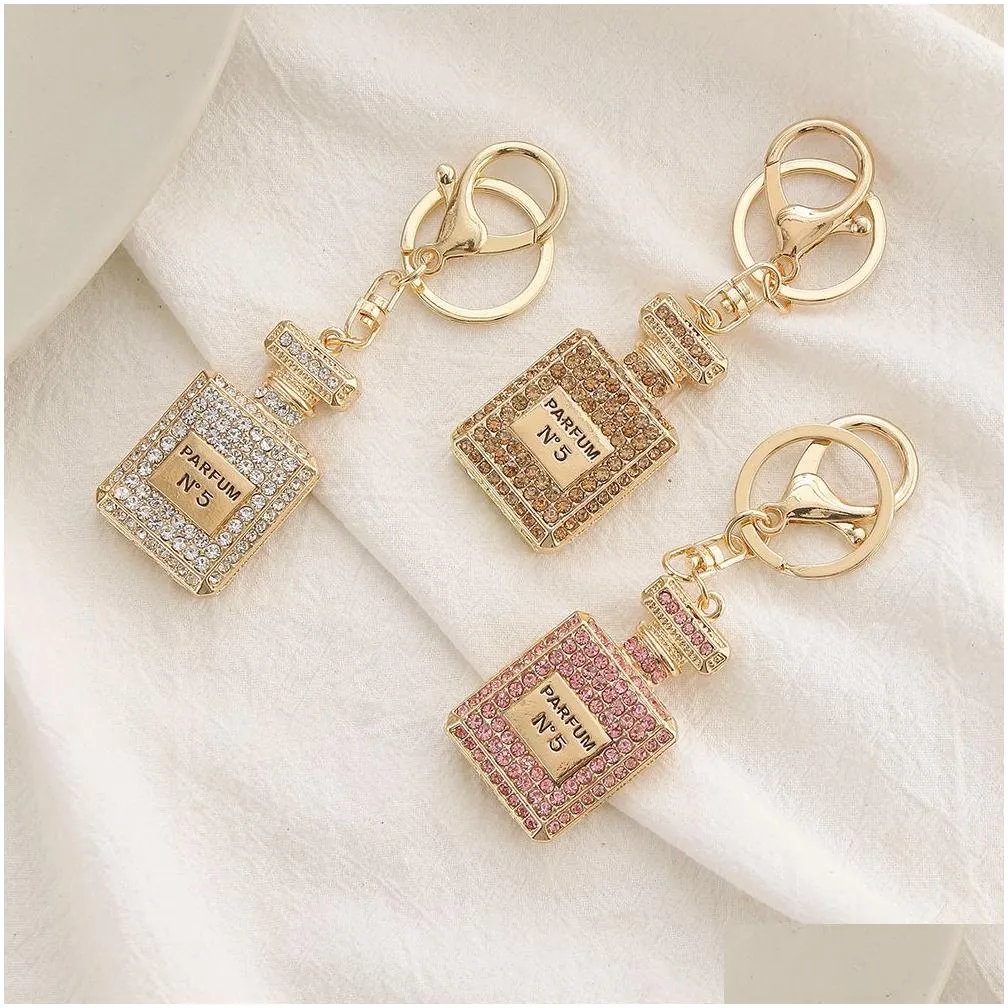 crystal perfume bottle keychains for women creative diamond bow metal key chain car bag pendant small gift jewelry accessories