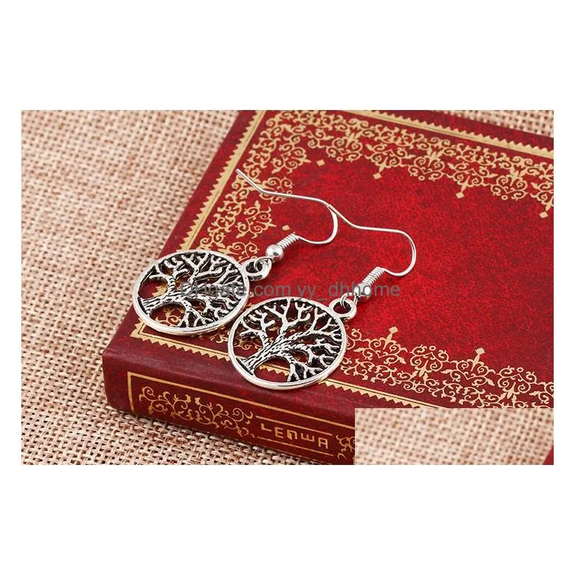 2016 retro personality earrings hollow peace tree and fatimas hand stud earrings fashion jewelry for women wild eardrop