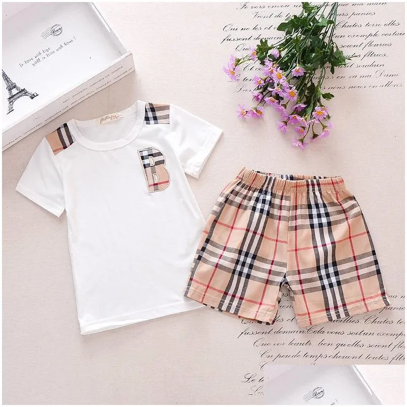2022 spring baby clothes set boy girl plaid pocket short sleeved shirt add plaid shorts 1-7 years old suit kids childrens 2pcs clothing