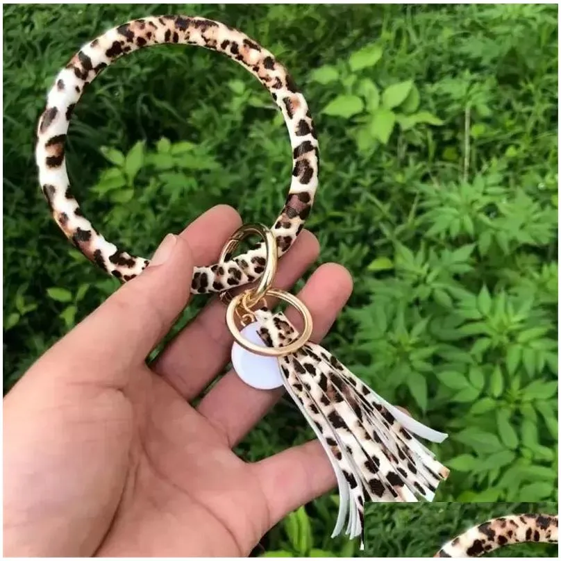 fashion party favor multiple designs sun flower pattern key chain leather wrap tassels bracelets keychain wristlet bracelet tassel round bangle keyring