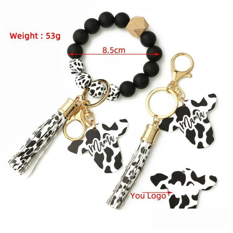 2023 fashion silicone cursive cow bead bracelet wood disk bracelet keychain cow tassel ox head wrist key ring charm pendant accessory fy3450