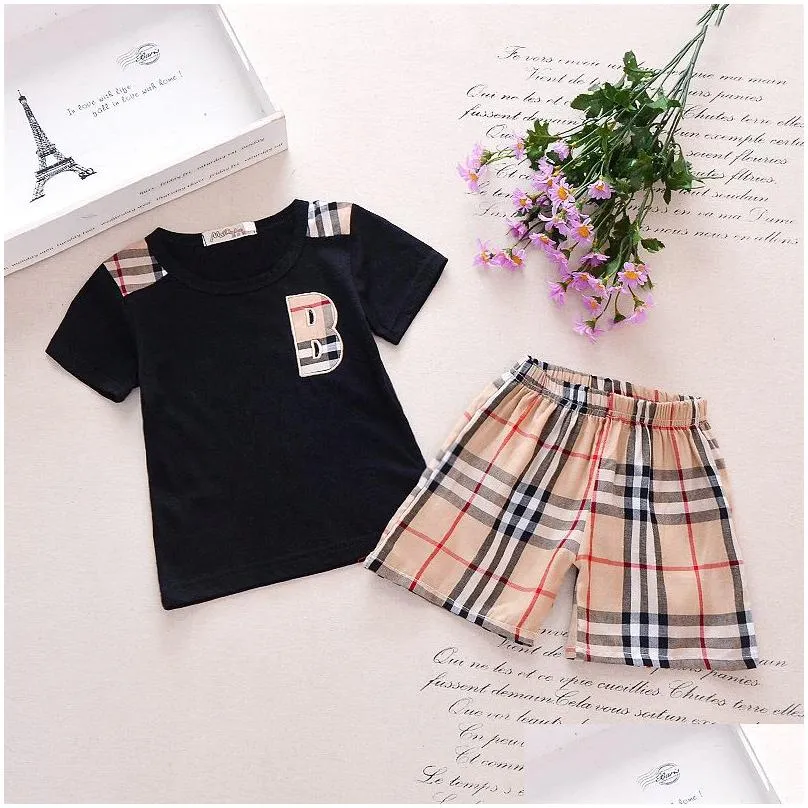 2022 spring baby clothes set boy girl plaid pocket short sleeved shirt add plaid shorts 1-7 years old suit kids childrens 2pcs clothing