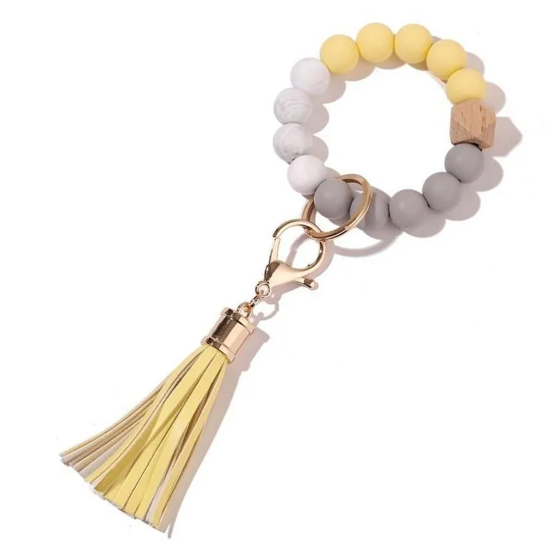 party silicone wooden beads keychain suede tassel bracelet keyring anti-lost bangle key ring for home wood beaded crafts car decoration pendant