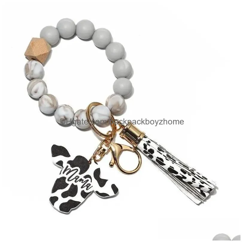 fedex silicone cursive party favor cow bead bracelet wood disk bracelet keychain cow tassel ox head wrist key ring charm pendant