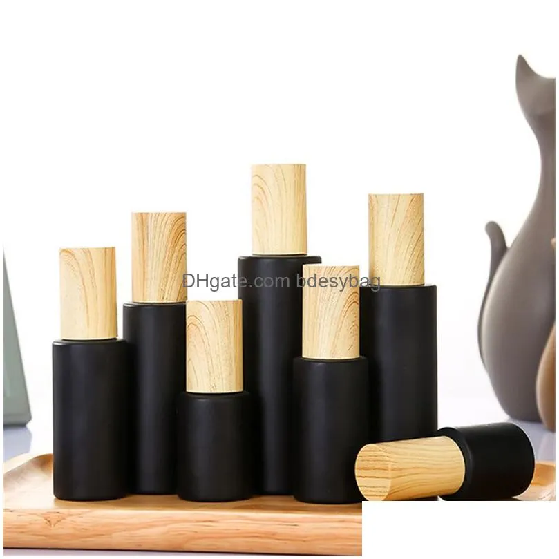 black frosted glass cream bottle cosmetic lotion spray bottles empty refillable jars with wood grain plastic lids
