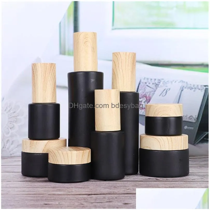 black frosted glass cream bottle cosmetic lotion spray bottles empty refillable jars with wood grain plastic lids