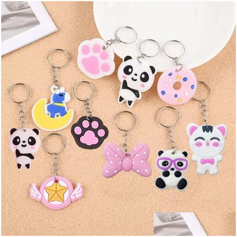 100 pcs cartoon anime keychain party favor cute keyrings wholesale pvc colorful pendants gift key ring holiday charms sets school rewards party supplier