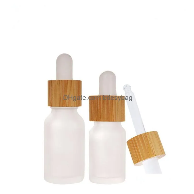 frosted clear glass dropper bottle with bamboo lid cosmetic packaging glasses liquid cosmetic containers