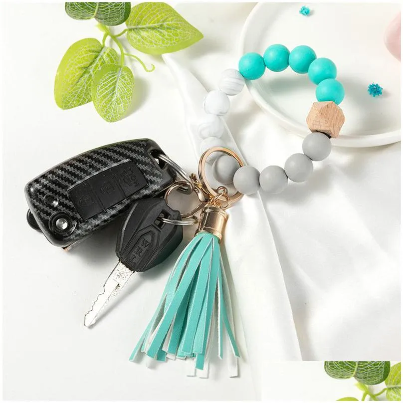 14 colors silicone key ring bracelet beaded wrislet keychain portable house car keys ring holder with tassel keyring bangle for women