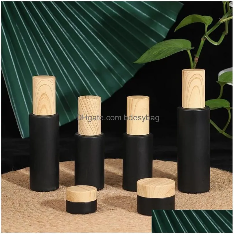 black frosted glass cream bottle cosmetic lotion spray pump bottles empty refillable jars with wood grain plastic lids