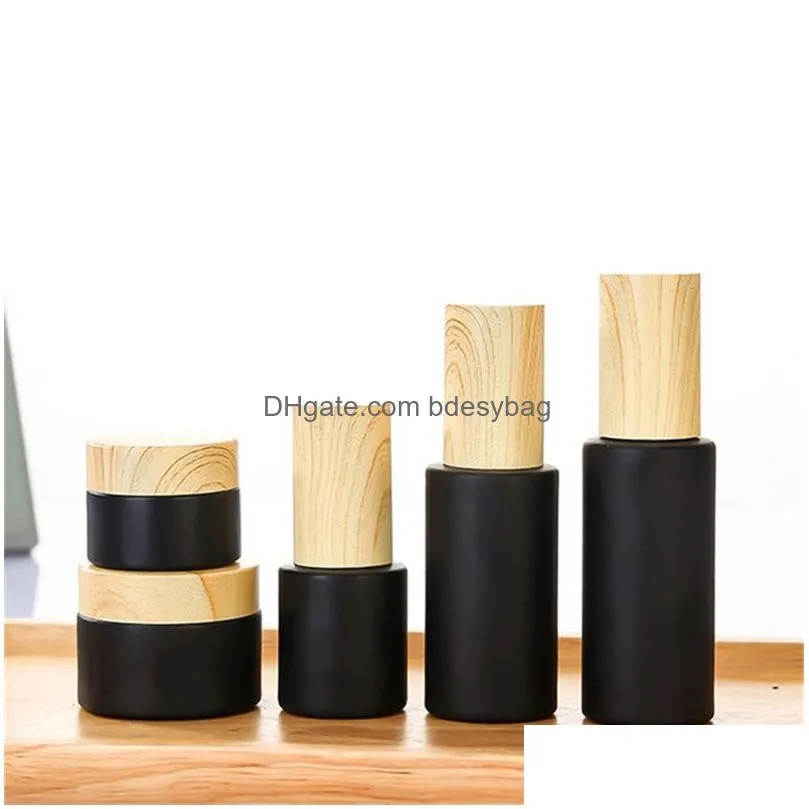 black frosted glass cream bottle cosmetic lotion spray pump bottles empty refillable jars with wood grain plastic lids