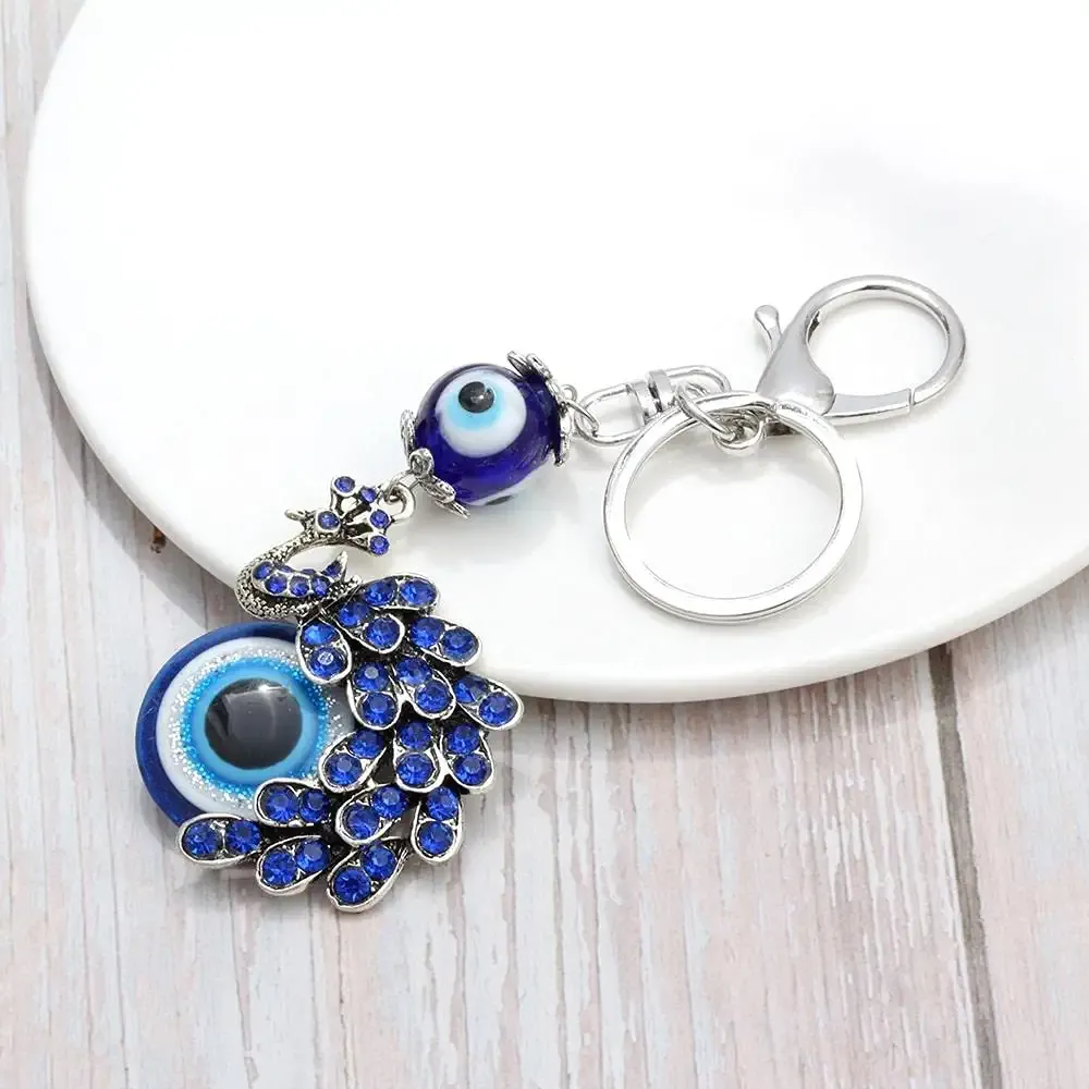 3ml evil eye metal charm key chain tassel pendant key holder car key rings blue beads keychains for men women jewelrypeacock