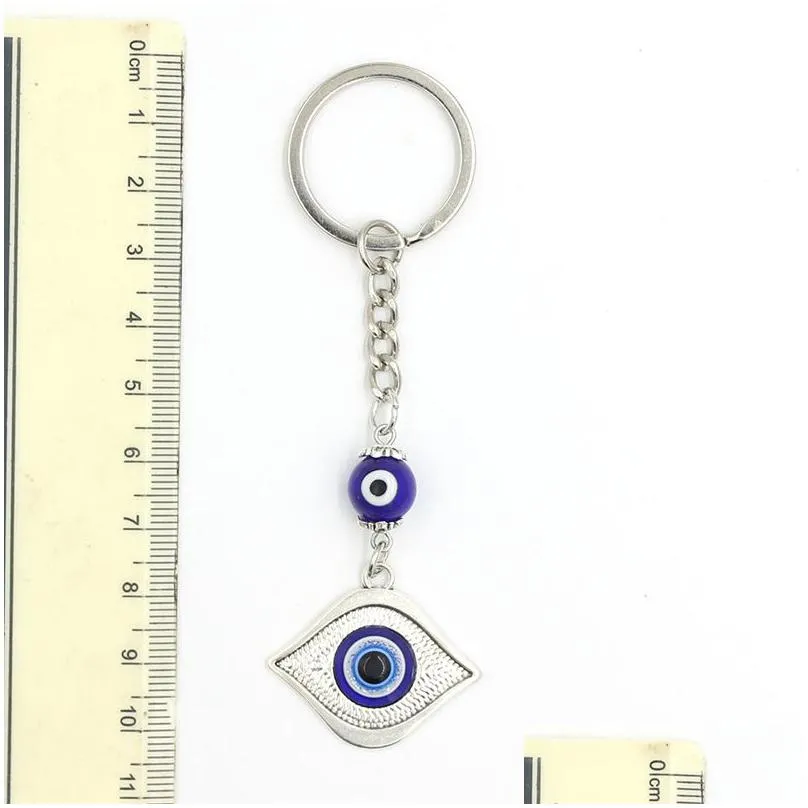 Key Rings Wholesale Round Cylinder Ceramics Blue Turkish Evil Eye Keychain Car Keyring Lucky Eyes Hamsa Hand Key Chain For W Dhgarden Dh7Hp
