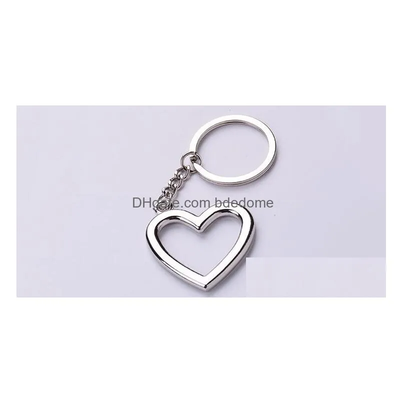 100Pcs/Lot New Novelty Zinc Alloy Heart Shaped Keychains Metal Keyrings For Lovers Drop Delivery Dhem7