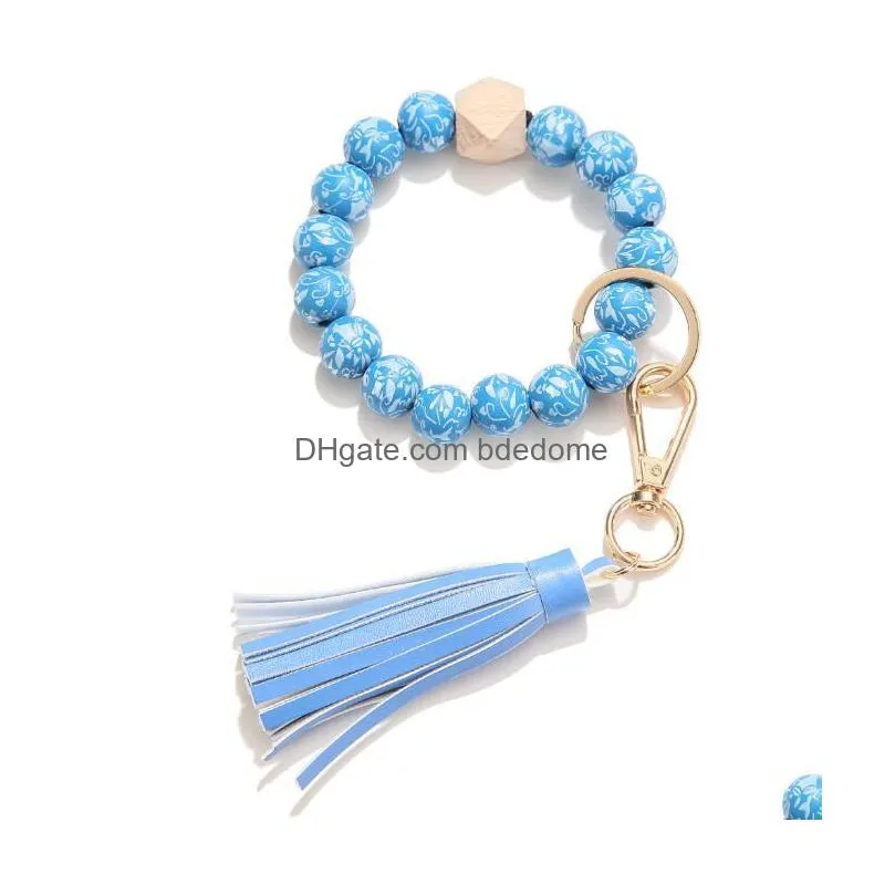 Fashion Flower Pattern Wood Beads Bracelets Keychains Leather Wrap Tassels Bracelet Keychain Round Bangle Keyring Drop Delivery Dh2Pz