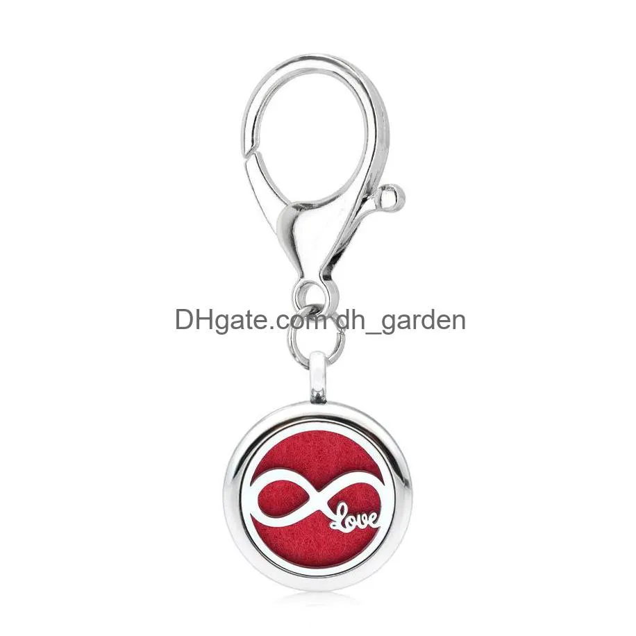 Key Rings Live Love Dream Aroma Key Chain Locket Essential Oil Per Diffuser With Heart Shape Lobster Clasp Ring 5Pcs Pads Dr Dhgarden Dhljt