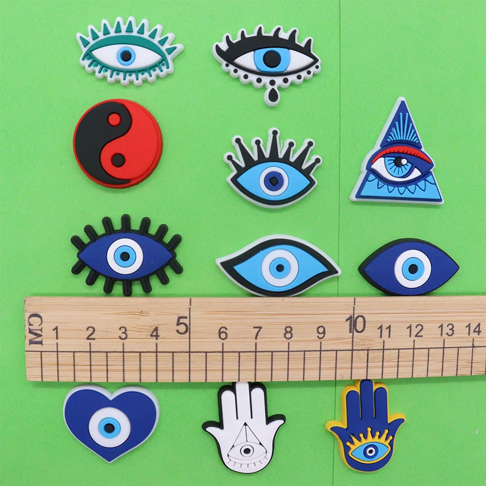 mixed 50pcs pvc devil eyes shoes charms eye heart hand tai chi buckle clog ornaments croc jibz fit wristbands kids decorations