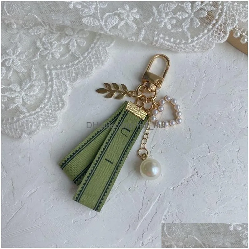 designer keychain luxury key chain bag charm female car key ring pearl charm green ribbon delicate shells keychain couple pendant gift nice