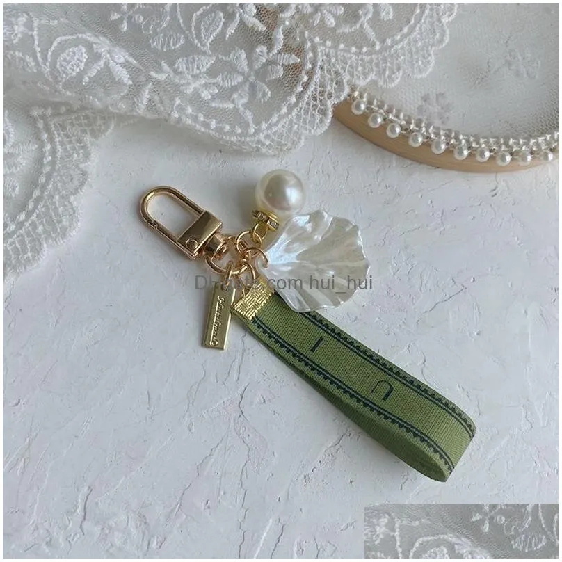 designer keychain luxury key chain bag charm female car key ring pearl charm green ribbon delicate shells keychain couple pendant gift nice
