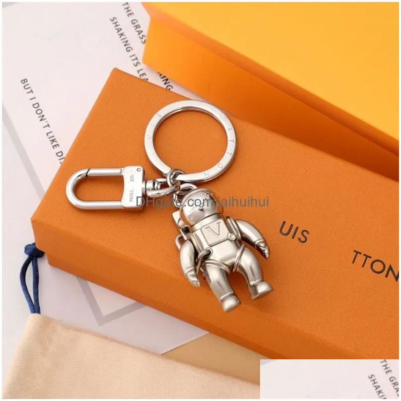 luxurys designers keychain car key chain solid color monogrammed keychains fashion leisure astronaut men women bag pendant accessories with box 2 options good