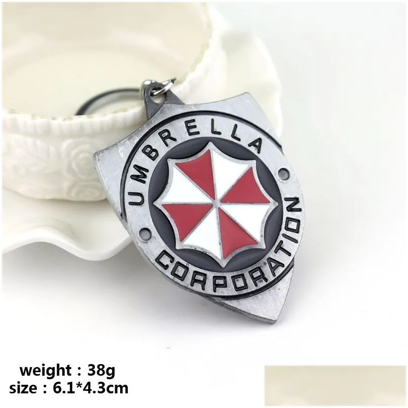 Keychains & Lanyards Resident Evil 2 Colors Alloy Keychain Umbrella Corporation Logo Shield Shape Hoder For Fans Unique Movie Jewelry Dhnyh