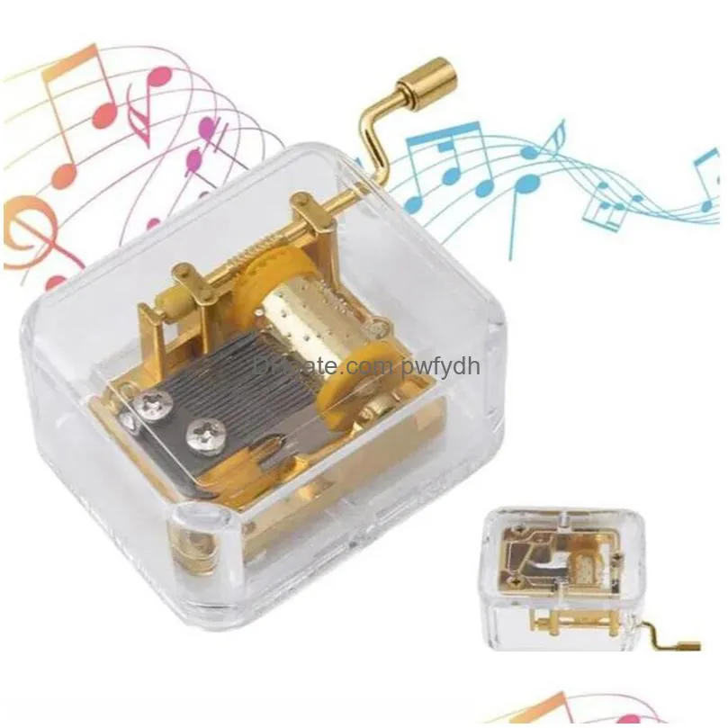 wholesale musical box acrylic hand novelty items crank music box golden movement melody castle in the sky