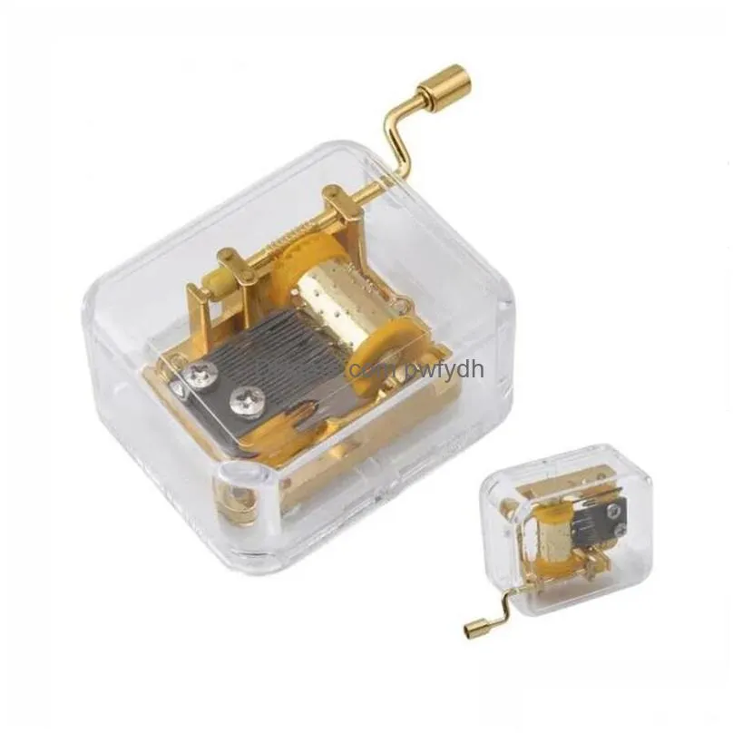 wholesale musical box acrylic hand novelty items crank music box golden movement melody castle in the sky