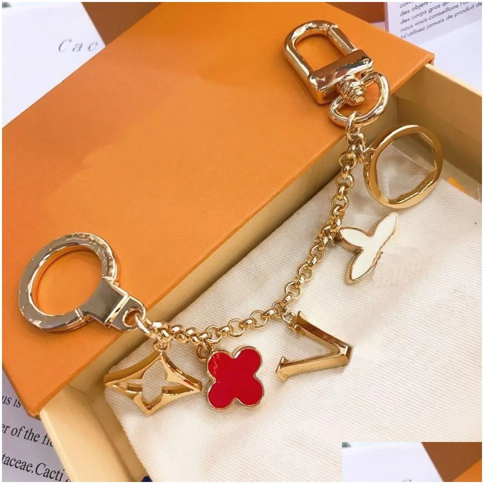 luxury designer keychain fashion classic brand key buckle flower letter key chain handmade gold keychains mens womens bag pendant