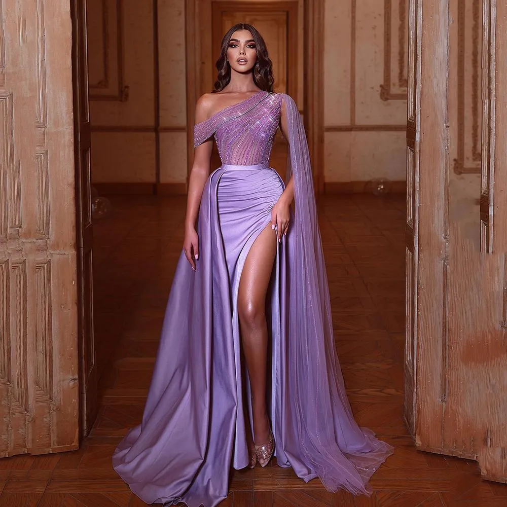 2023 Purple One Shoulder Prom Dresses Sexy Crystal Beading Top Side Split Ruched Satin Tulle Arabic Dubai Females Robe de Soiree with Cape Mermaid Evening Gowns