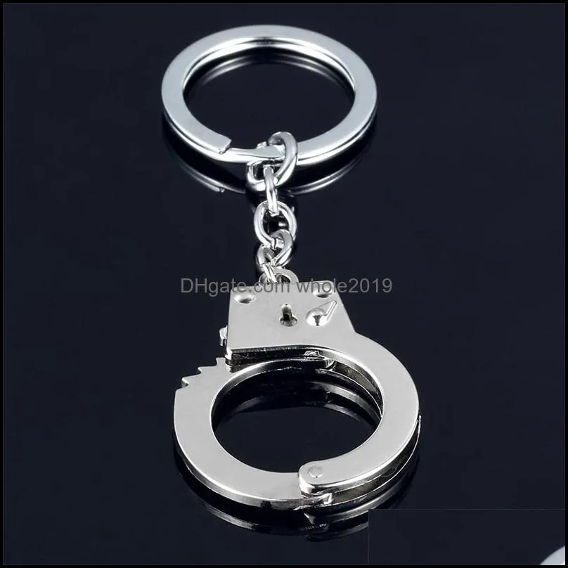 key rings simulation handcuffs metal keychain car key bottle opener men and women keychain 79 e3