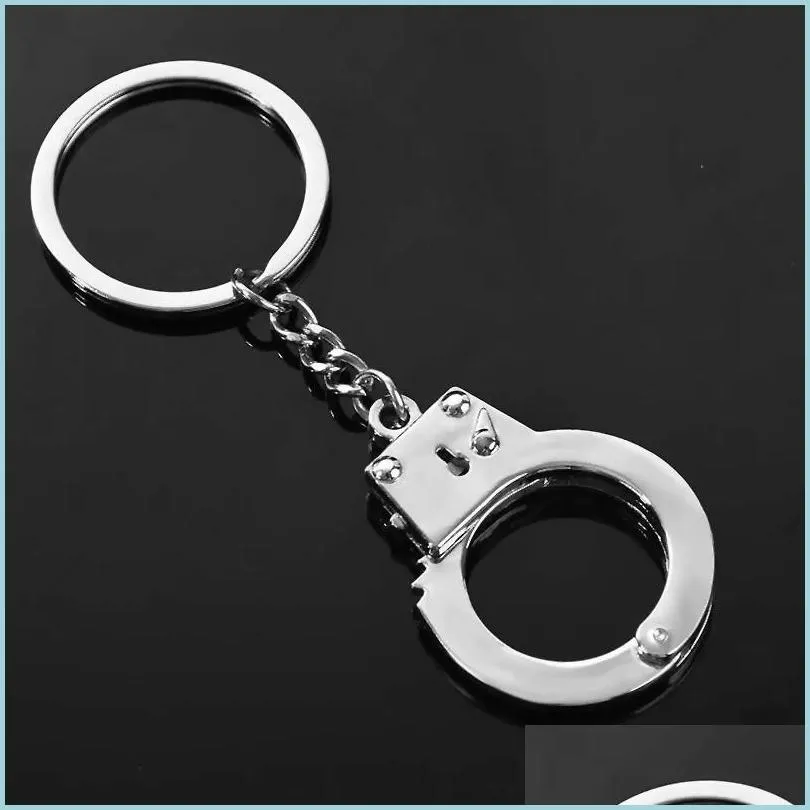 key rings simulation handcuffs metal keychain car key bottle opener men and women keychain 79 e3