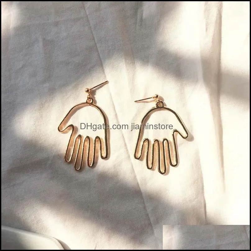 european and american eccentric personality metal minimalist earring alloy plating hollow hand face stud earrings for women gift