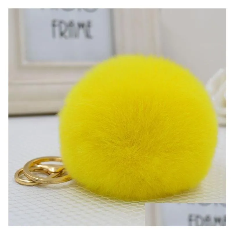 keychains wholesales 17 color fluffy fur pompom keychain women bag charm real natural balls genuine pom poms key chain f252 emel22